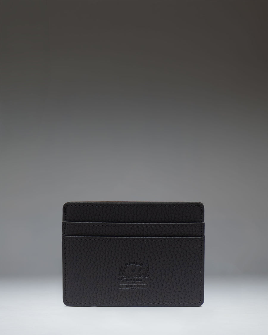 Herschel Supply Co. Charlie Cardholder Vegan Leather in Black. Front view showing multiple card slots and classic woven logo label.