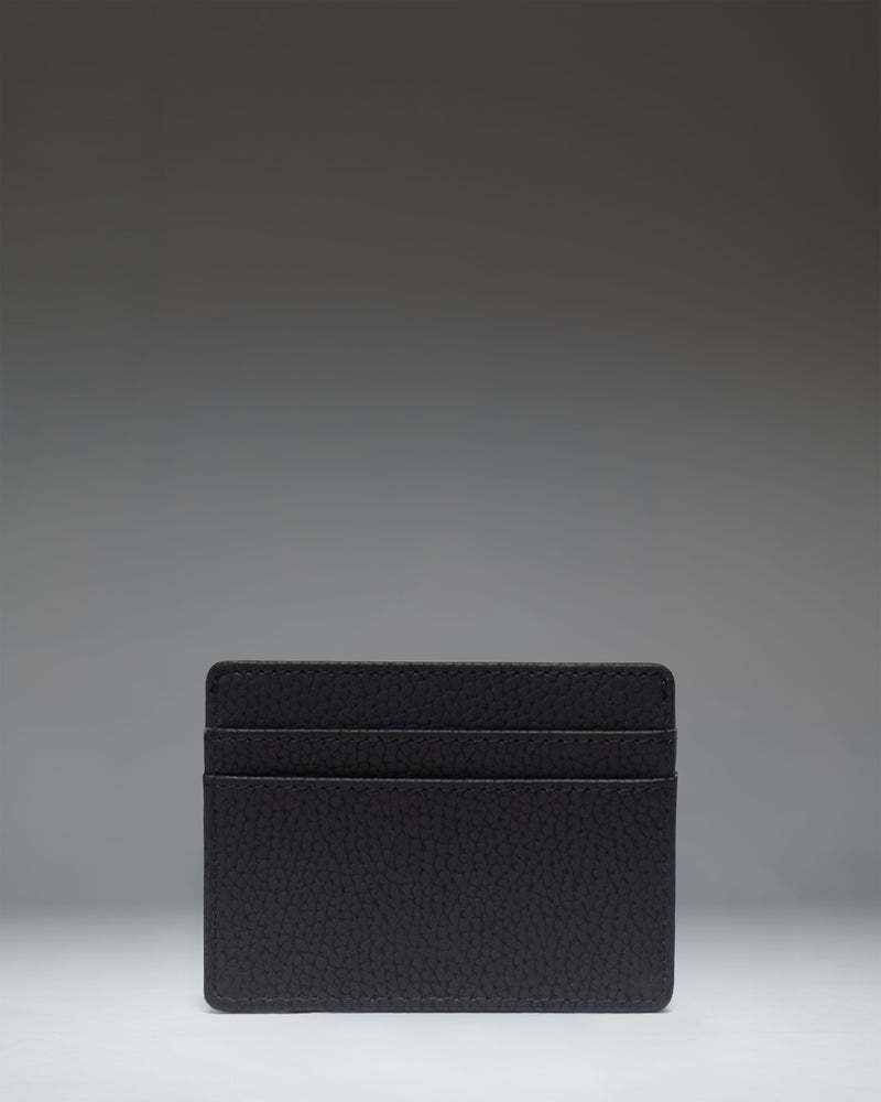 Herschel Supply Co Charlie Cardholder Vegan Leather in black, showing the front card slots and classic woven label.