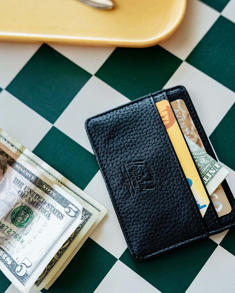Herschel Supply Co. Charlie Cardholder Vegan Leather wallets displayed in a variety of colors.