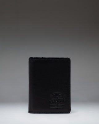 Black Herschel Supply Co. Gordon Wallet Leather shown open, displaying internal card slots and bill compartment.