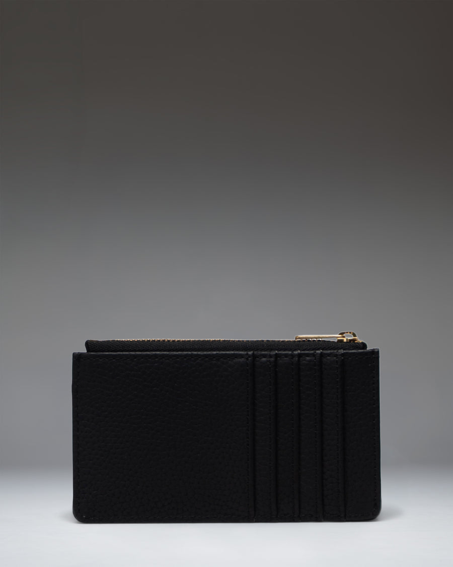 Black vegan leather Herschel Supply Co. Oscar Large Cardholder showing card slots and compact design.