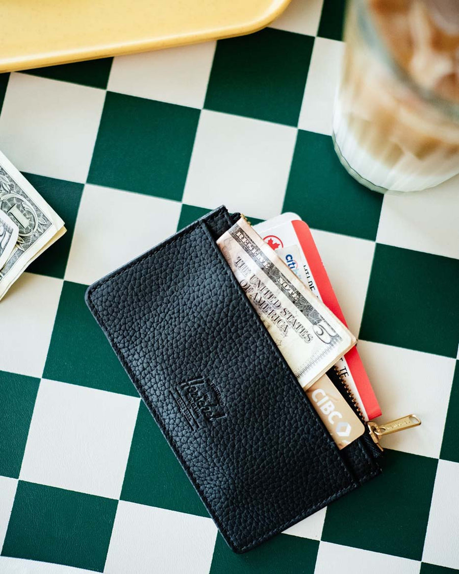 Herschel Supply Co. Oscar Large Cardholder Vegan Leather wallets displayed in a variety of different colors.