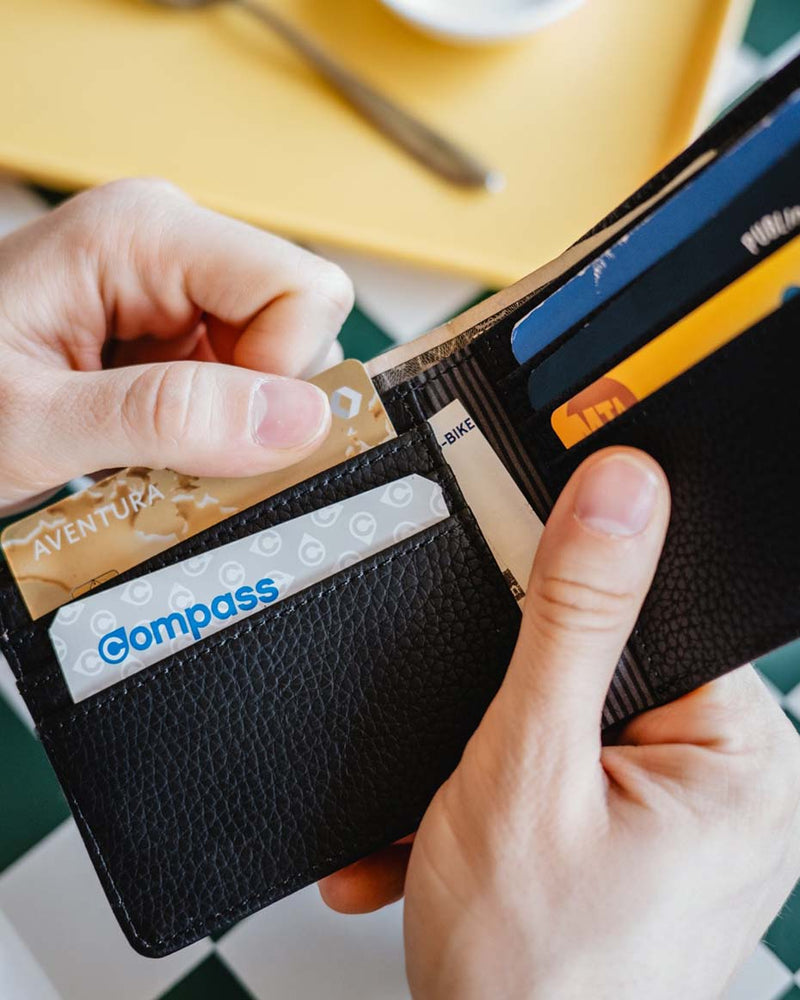 Herschel Supply Co. Roy Wallet Vegan Leather showing all color options in a classic bi-fold design.