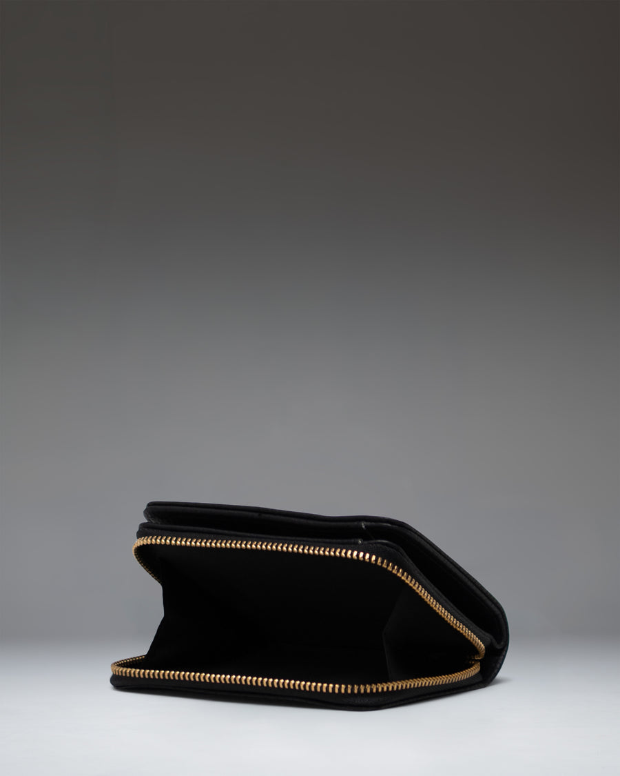 Black Herschel Supply Co Georgia Wallet in vegan leather.