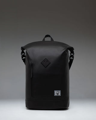 Black Herschel Supply Co. Roll Top Backpack shown from the front, highlighting its roll-top closure and clean, minimalist design.