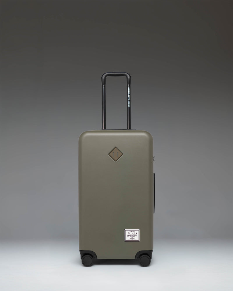 Herschel Heritage Hardshell Medium Luggage in Ivy Green.