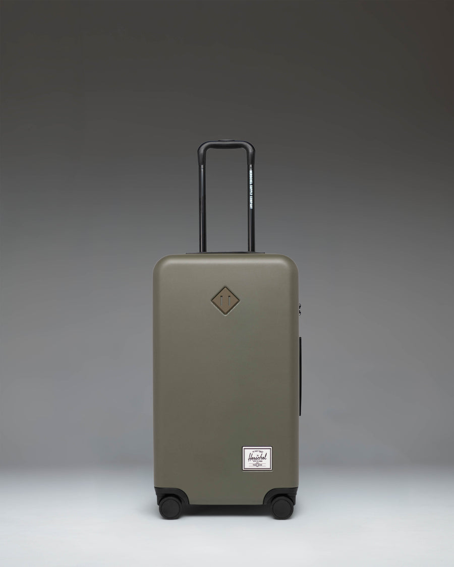 Herschel Heritage Hardshell Medium Luggage in Ivy Green.
