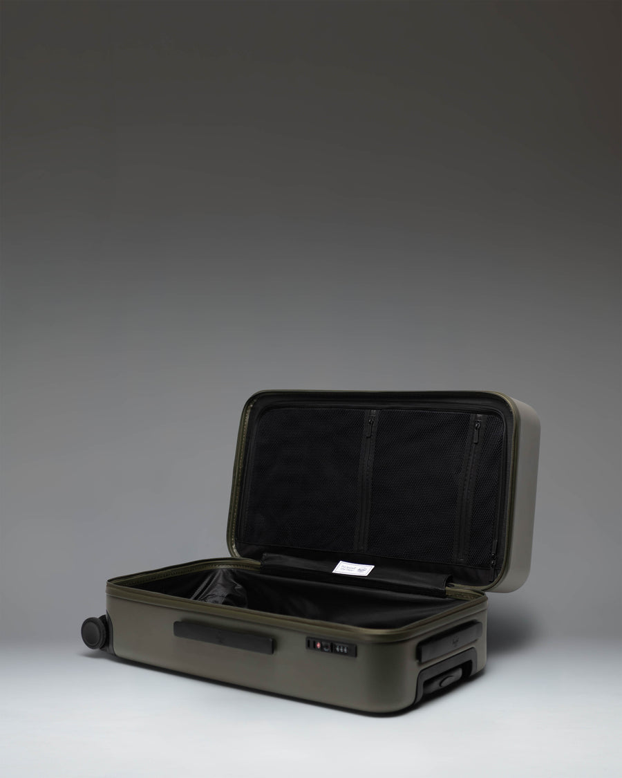 Herschel Heritage Hardshell Medium Luggage in Ivy Green.