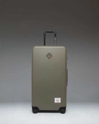 Herschel Heritage Hardshell Large Luggage in Ivy Green.