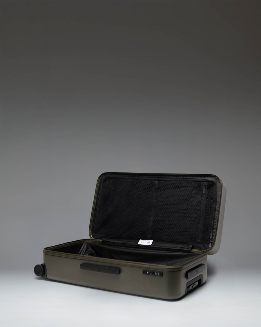 Herschel Heritage Hardshell Large Luggage in Ivy Green.