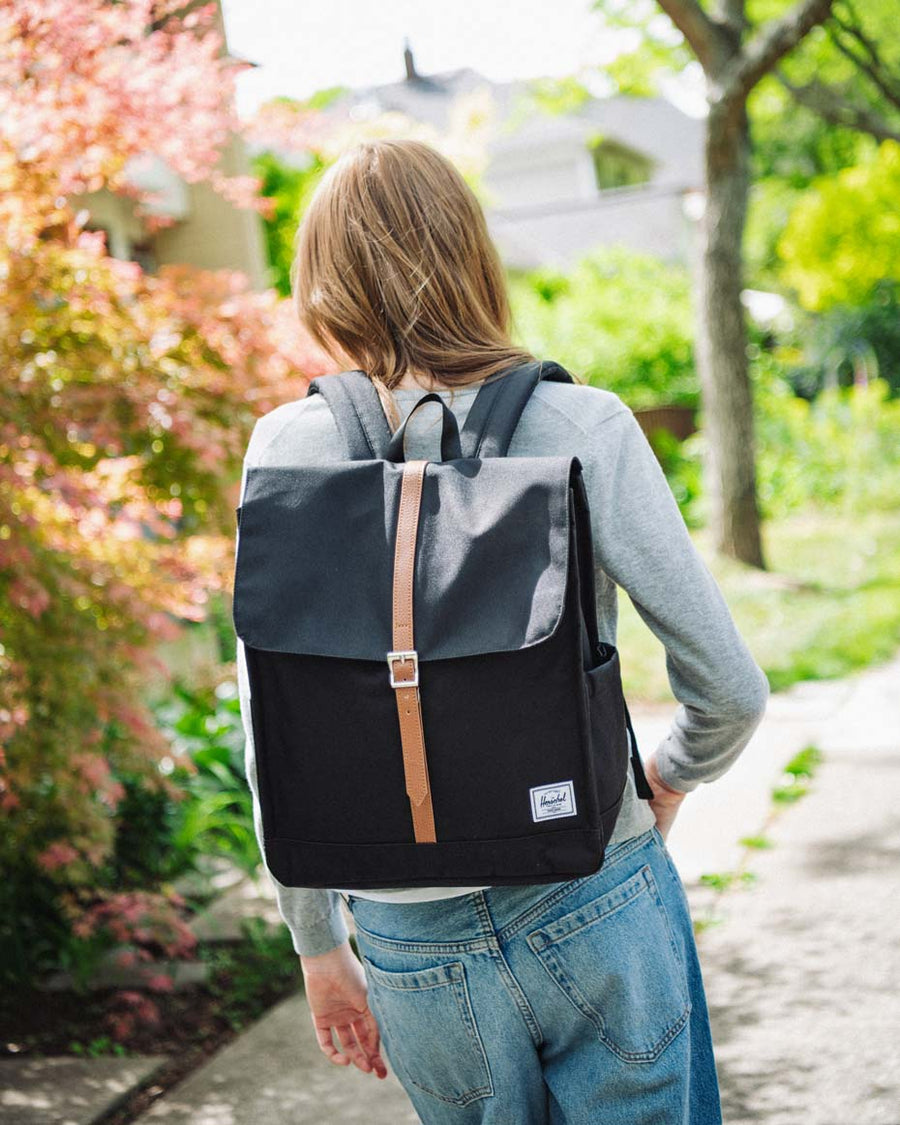 Herschel Supply Co. City Backpack color guide chart featuring multiple color swatches including Ivy Green, Black, Chocolate, and Moonbeam.