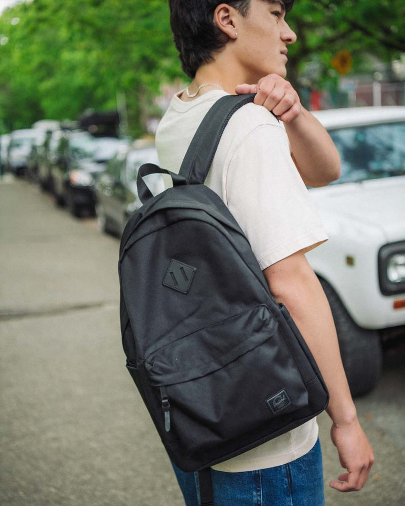 Herschel Heritage Backpack. Timeless design featuring a clean aesthetic, signature diamond detail, and a front storage pocket.