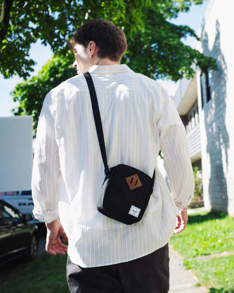 Herschel Heritage Crossbody bag shown in a grid of multiple available color options.