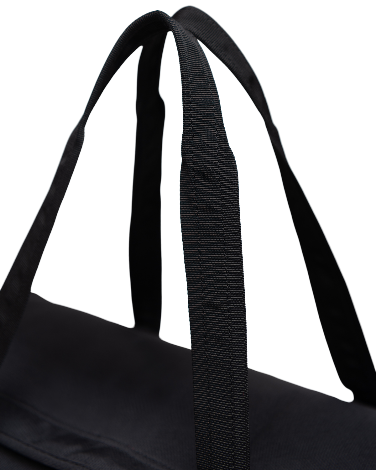 Herschel Heritage Duffle bag shown in use or display, highlighting its classic design, diamond detail, and easy-access U-shaped opening.