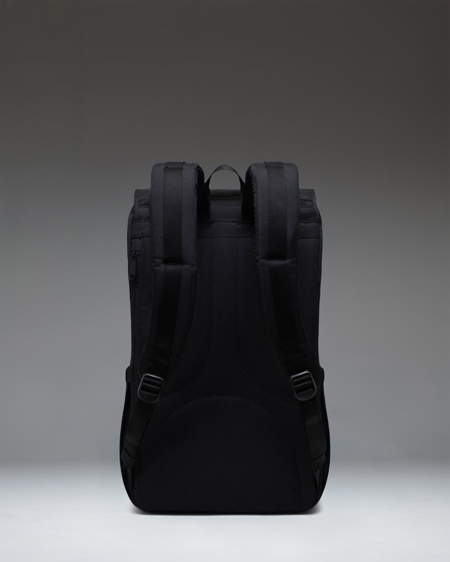 Herschel Little America Backpack in black, featuring a classic mountaineering design with dual magnetic strap closures and front pocket.