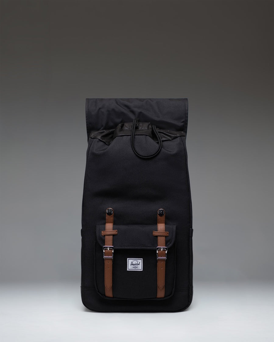 Herschel Supply Co. Herschel Little America Backpack in classic black with iconic rubber straps and front pocket.
