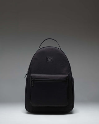 Herschel Nova Backpack in Black Tonal, showing the front view with dual top carrying handles and a front storage pocket.
