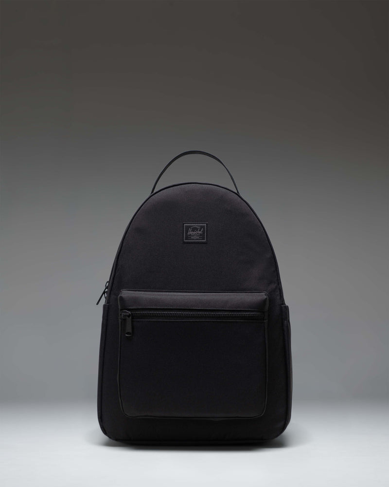 Herschel Nova Backpack in Black Tonal, showing the front view with dual top carrying handles and a front storage pocket.