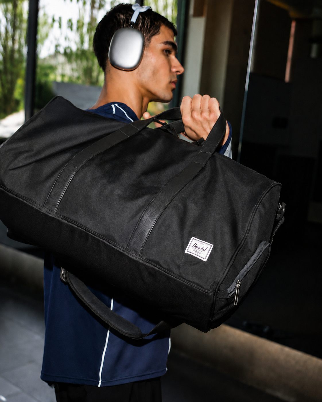 A graphic showing the dimensions of the Herschel Novel Duffle: 11.75 inches height, 20.5 inches width, 11 inches depth, and a 42.5-liter capacity.