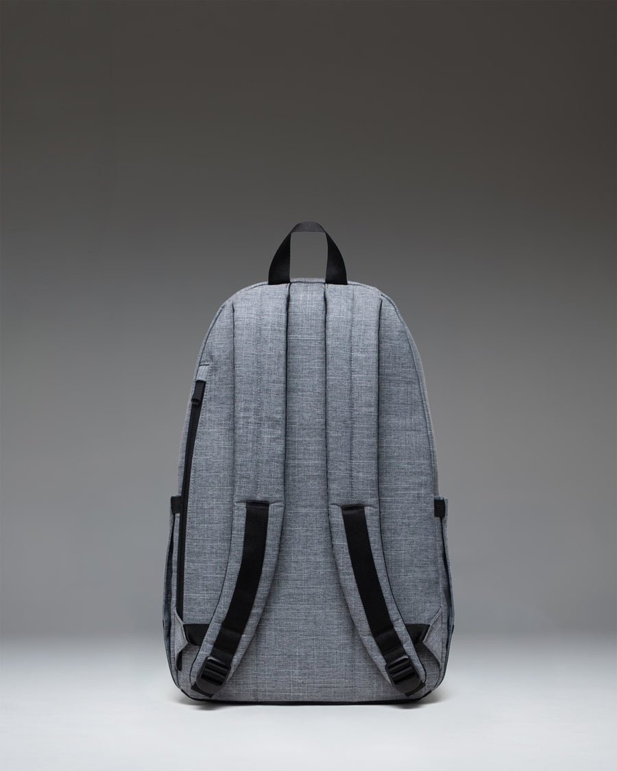 Herschel Seymour Backpack in Raven Crosshatch heather grey, featuring a classic zippered design with a front pocket and adjustable straps.
