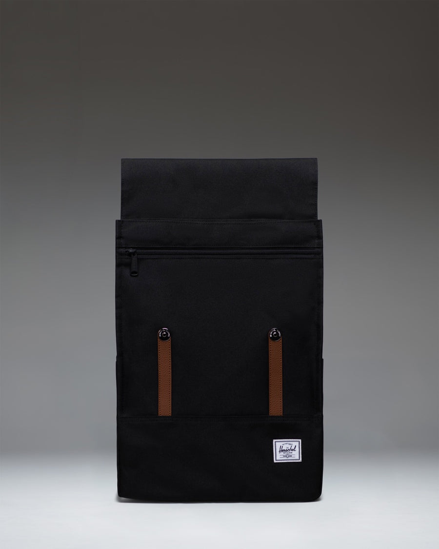 Herschel Survey Backpack in Black featuring a classic design with dual strap closures, perfect for everyday use, school, or travel.
