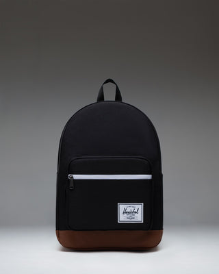 Herschel Supply Co. Pop Quiz Backpack in Black/Tan featuring a front pocket, leather accent, and signature woven label.