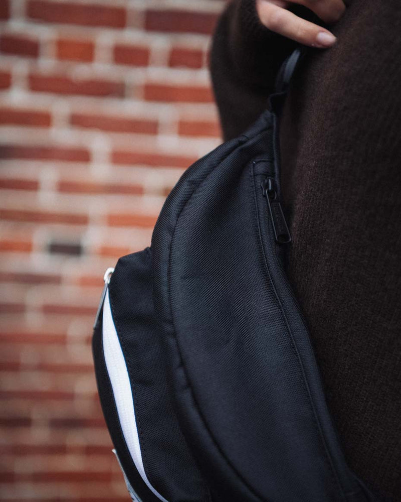 Herschel Pop Quiz Hip Pack size guide chart. Dimensions: 7 inches Height x 12.25 inches Width x 3.5 inches Depth. 3.5-liter capacity.