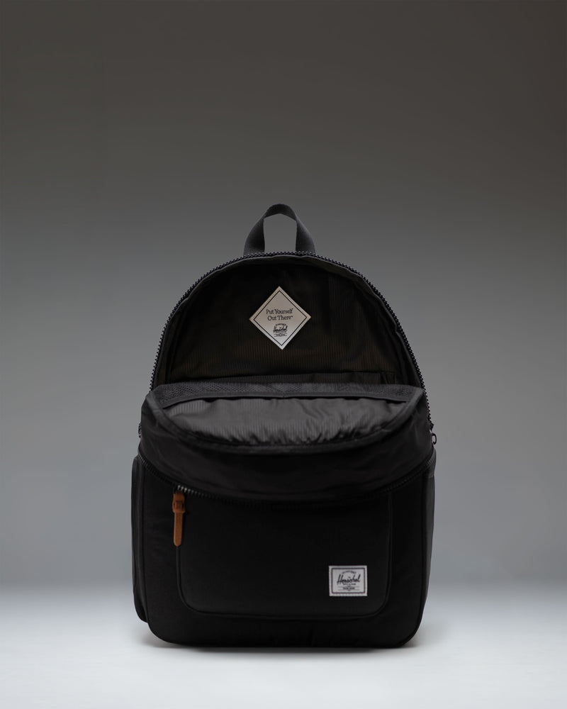 Herschel Supply Co. Settlement Backpack Diaper Bag in black, featuring a classic design with front pocket and exposed zippers.