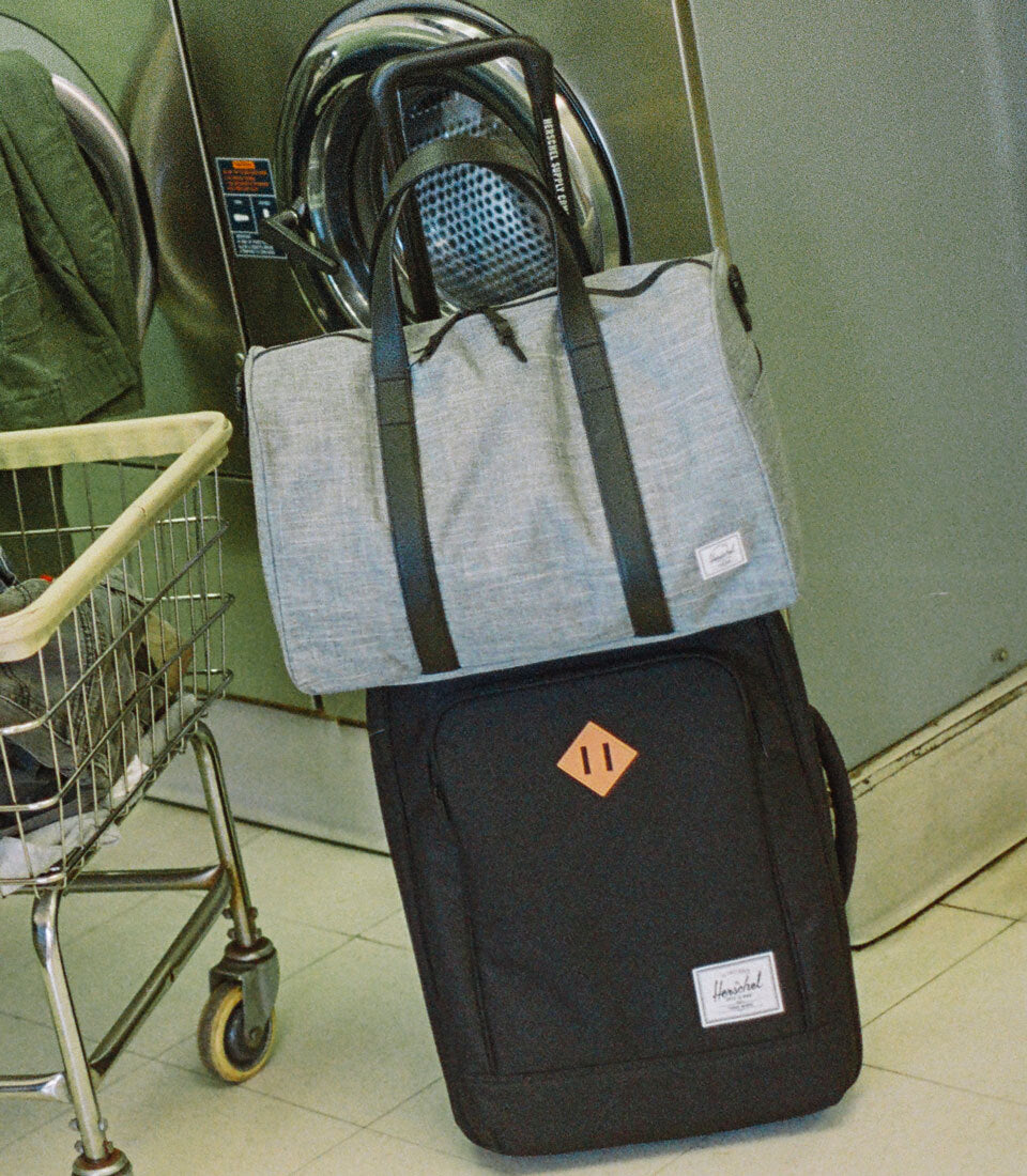 Herschel Novel Carry On Duffle bag showcasing its functional travel design and signature features.