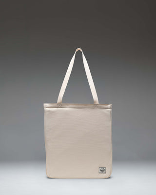 Herschel Supply Co. Inga Tote in Natural, featuring a clean canvas design with top handles and a subtle brand logo on the front.