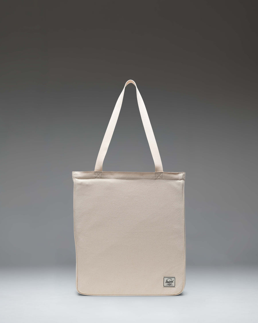 Herschel Supply Co. Inga Tote in Natural, featuring a clean canvas design with top handles and a subtle brand logo on the front.