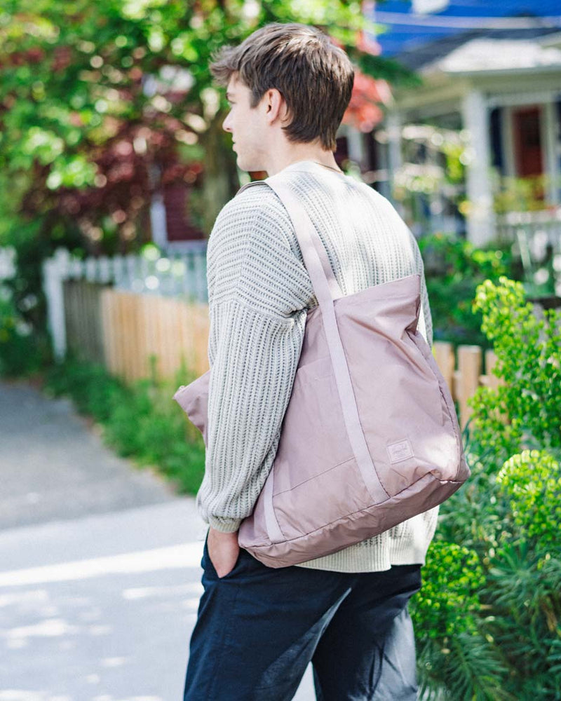 Herschel Supply Co. Portland Packable Totes arranged together showcasing a variety of available colors.