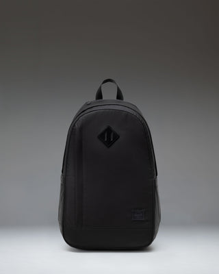 Herschel Seymour Backpack in black, showing the front view with dual straps, a front zippered pocket, and the classic Herschel woven label.