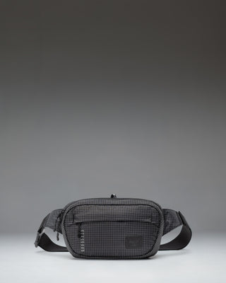 Herschel Supply Co Ultralight Hip Pack 2 L in Black shown from the front highlighting its lightweight design and adjustable strap.