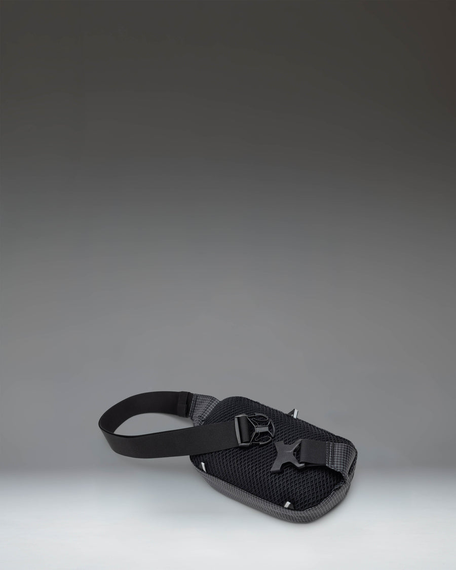 Herschel Supply Co. Ultralight Hip Pack 2L in Black, featuring a lightweight design with adjustable strap and zippered compartment.