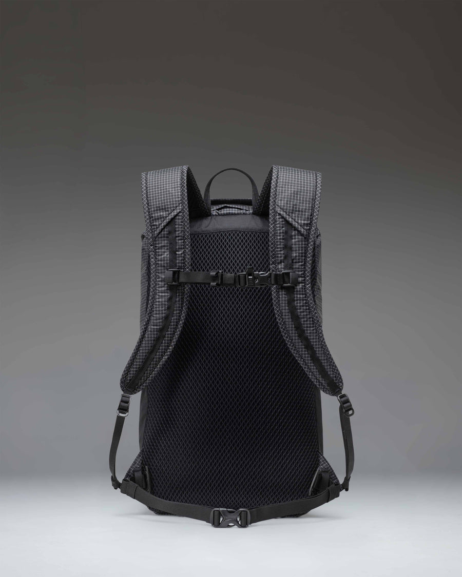Black Herschel Supply Co. Ultralight Backpack 22L showing a sleek technical daypack design with a drawcord closure and mesh pockets.