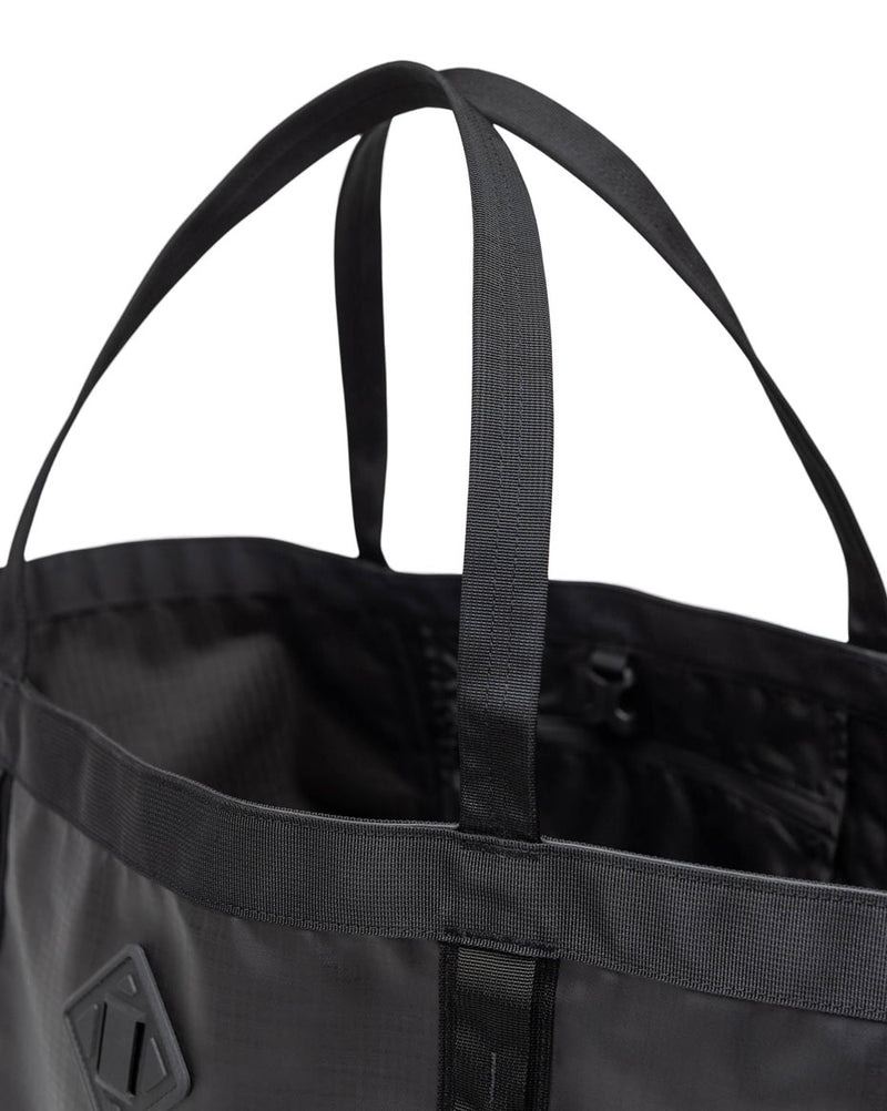 Herschel Supply Co. All Season Gear Tote 63L in a variety of color options displayed in a row.
