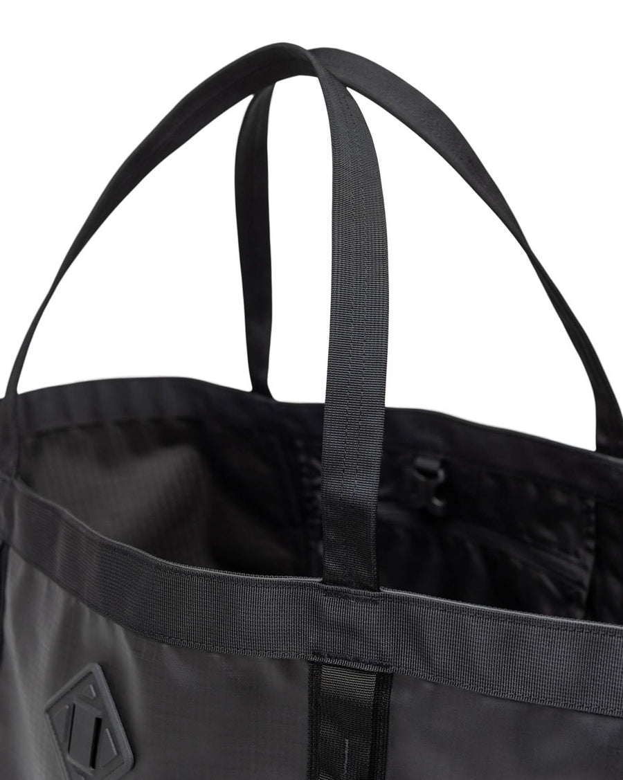 Herschel Supply Co. All Season Gear Tote 63L in a variety of color options displayed in a row.