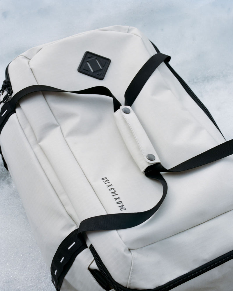 Herschel Supply Co. All Season Duffle 66L bags in a variety of vibrant colors arranged together on a plain background.