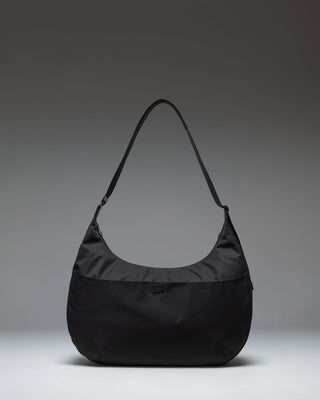 Herschel Supply Co. Yara Large Shoulder Bag in black, shown from the front.