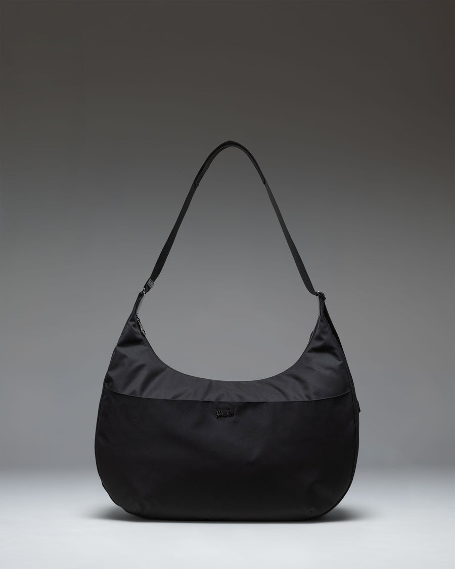 Herschel Supply Co. Yara Large Shoulder Bag in black, shown from the front.