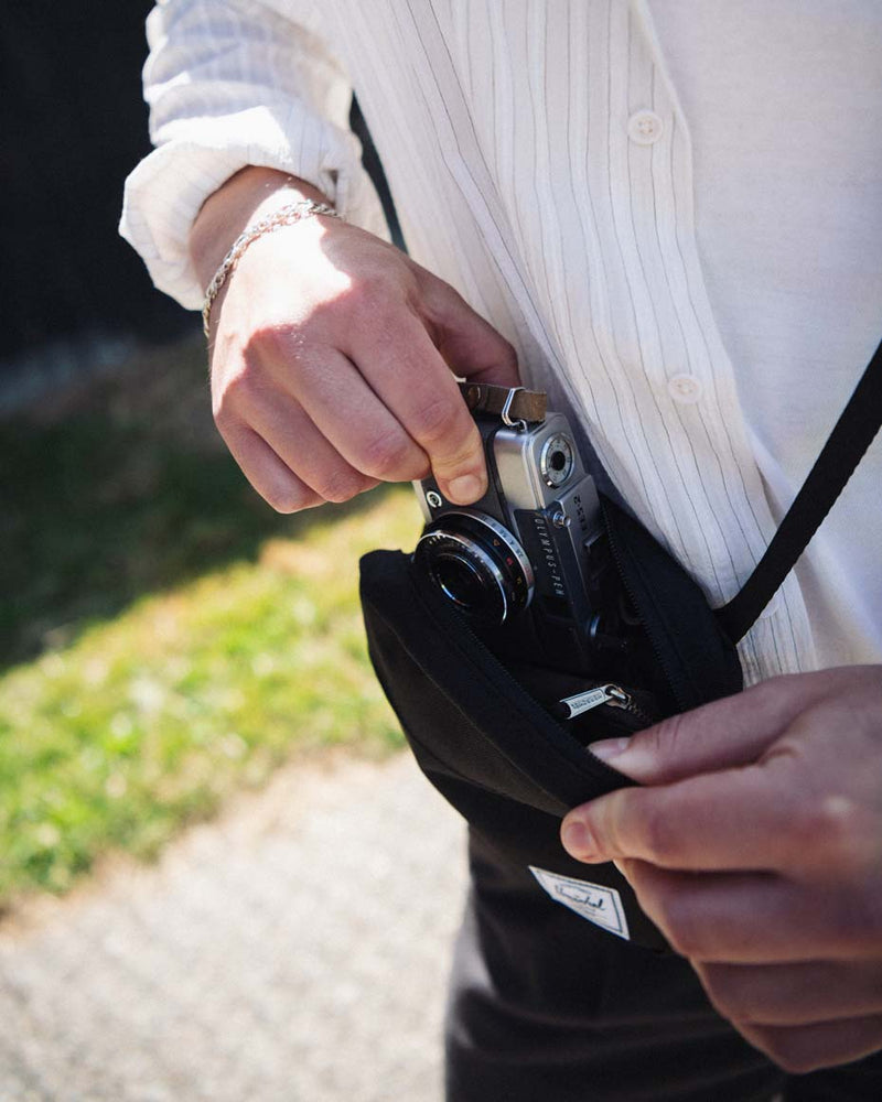 Herschel Classic Crossbody bag shown in a variety of available colors.