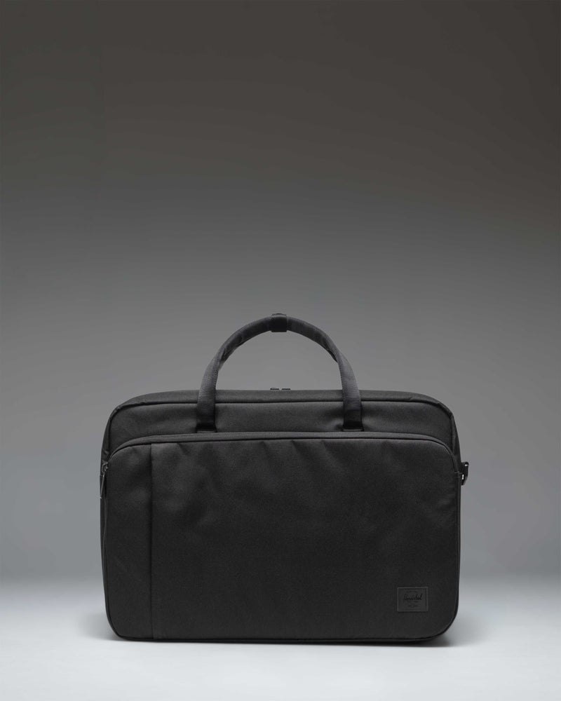 Black Herschel Supply Co. Bowen Convertible Travel Duffle Tech bag shown from the front.