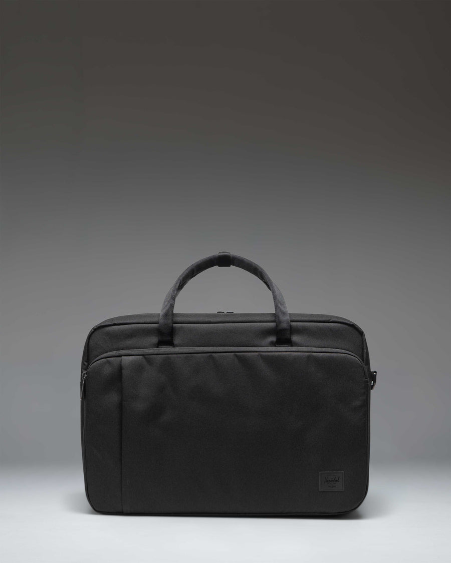 Black Herschel Supply Co. Bowen Convertible Travel Duffle Tech bag shown from the front.