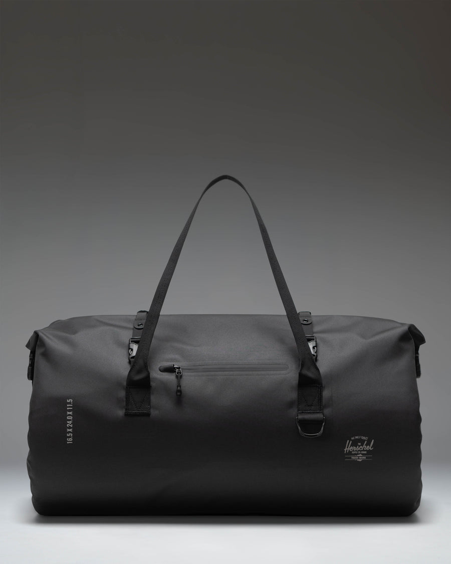 Herschel Supply Co. Dry Bag Duffle 55L in black, showcasing its durable waterproof material and roll-top closure design.
