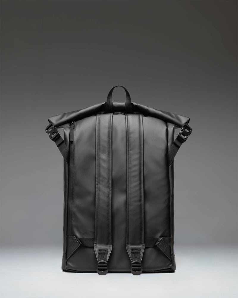 Herschel Supply Co. Roll Top Backpack in solid black, featuring its classic roll-top design and adjustable shoulder straps.