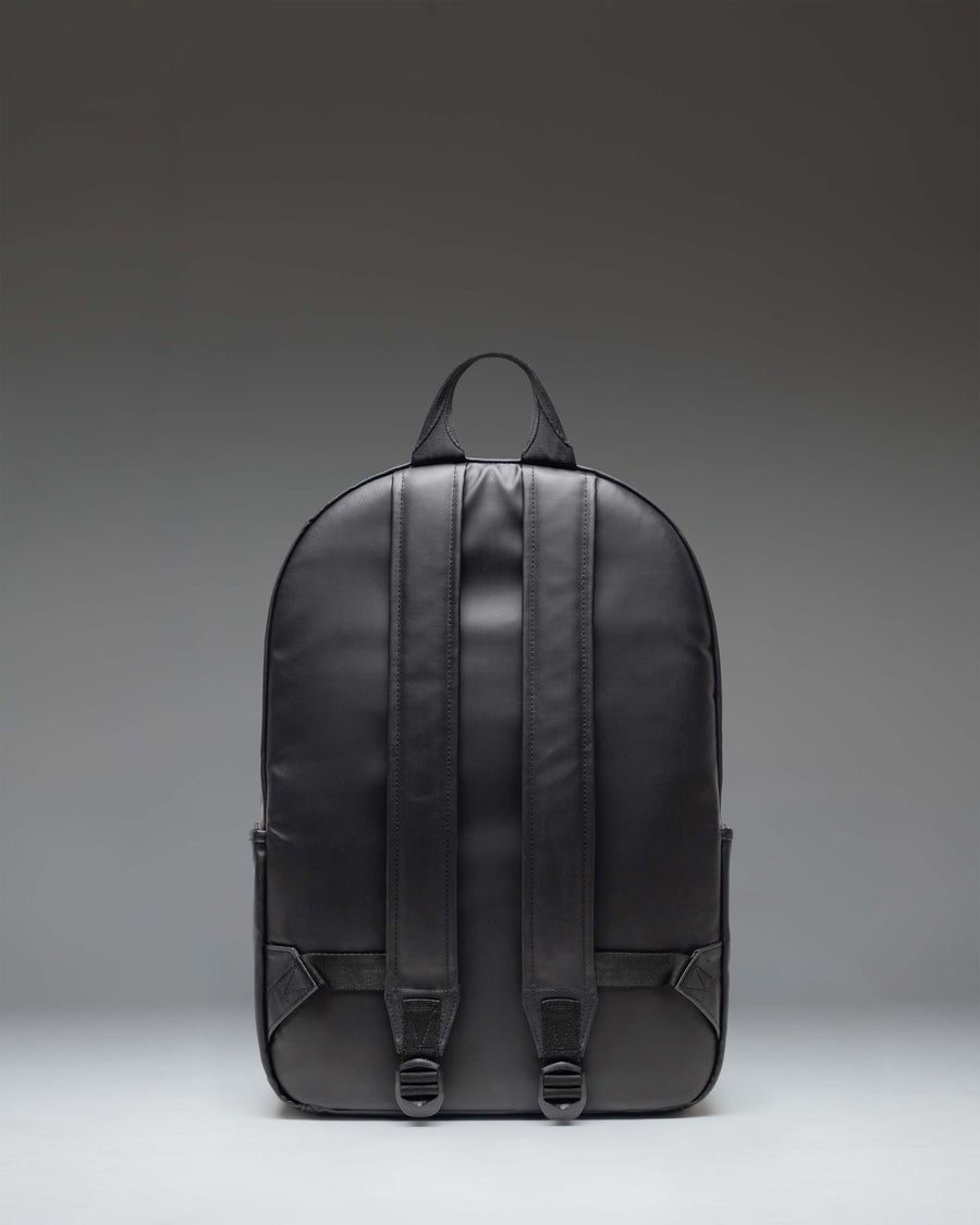 Herschel Supply Co. Alberni Backpack in black, featuring a minimalist everyday design with zippered compartments.