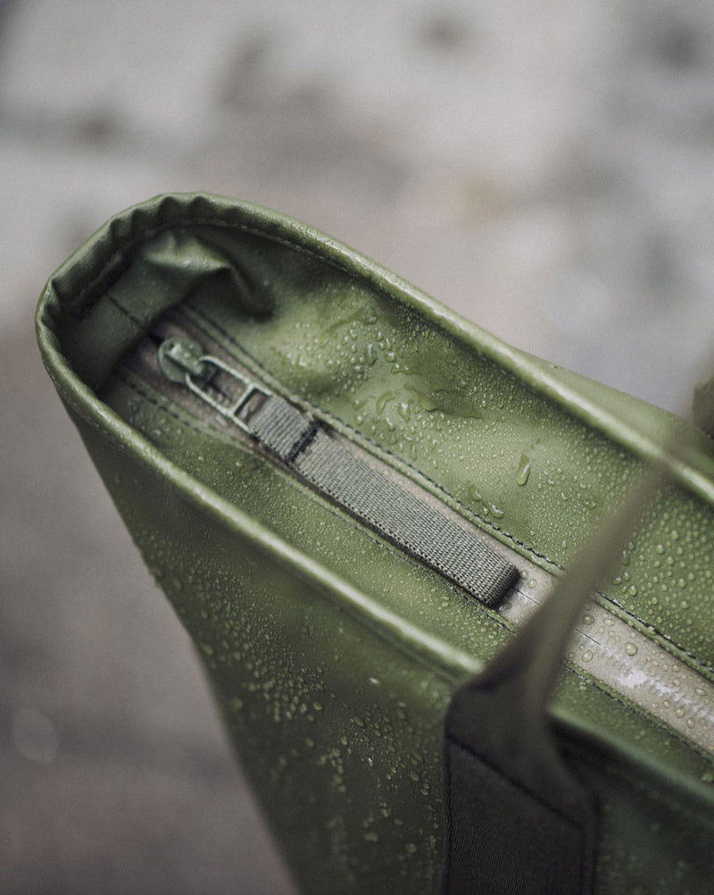 Herschel Supply Co. Alberni Tote weather-resistant bag shown in multiple colors to display color options.