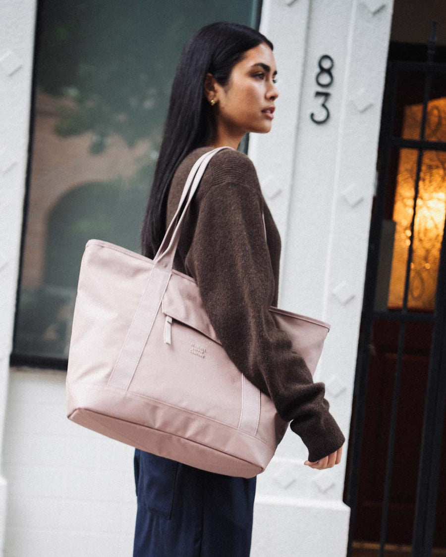 Herschel Supply Co. Alberni Tote bags displayed in a collection of multiple colors.