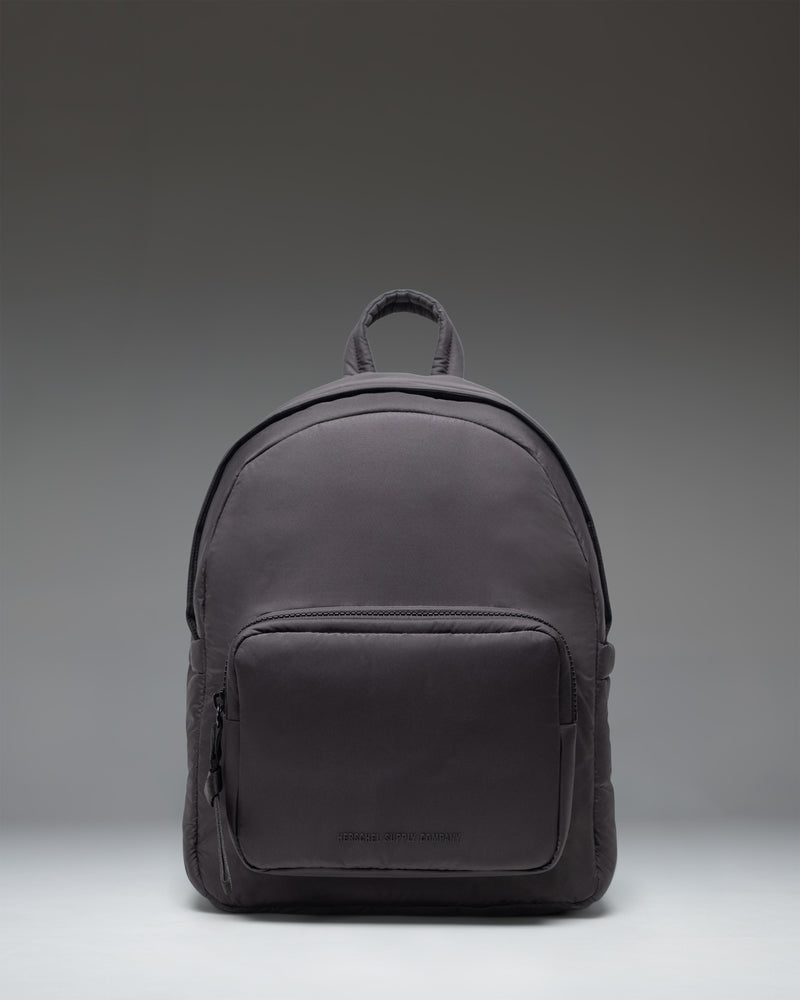 Herschel Supply Co. Cloudform Backpack in black, shown from the front, highlighting its clean design and durable construction.